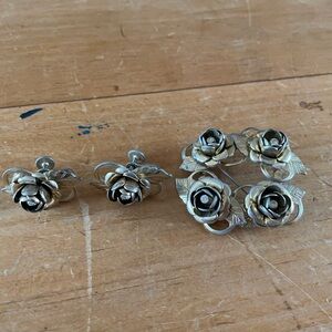 Gold tone and rhinestone flower brooch and earrings set